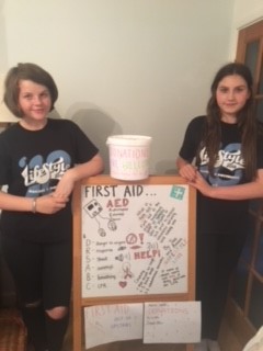 Jess and Amelia raising money for the Walkington defibrillator