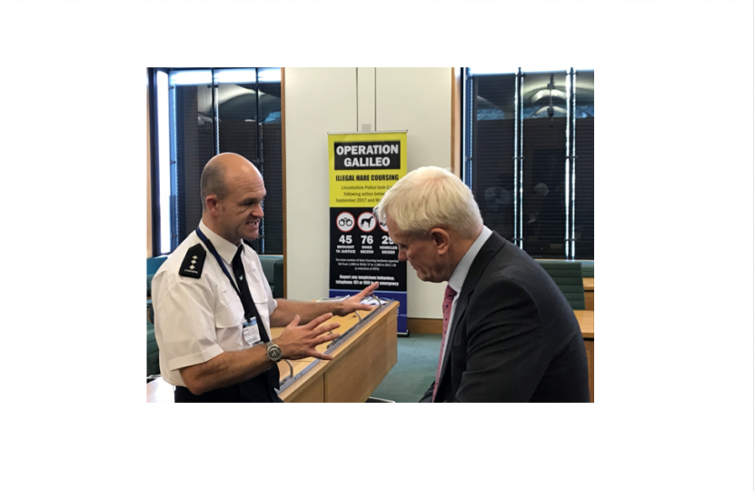 Graham with Lincolnshire Police representative at CLA Hare coursing event in Parliament.