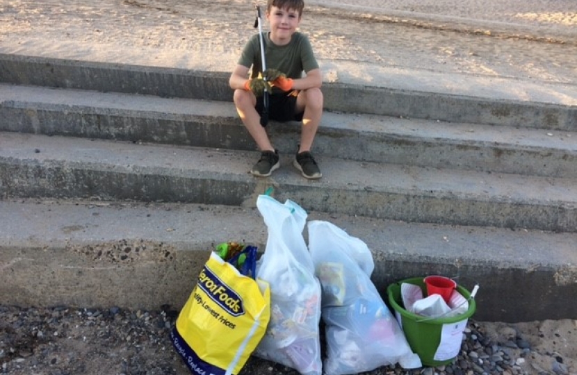 Jay Norris litter picking on Hornsea beach