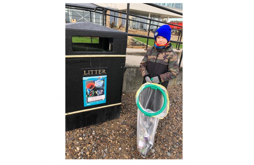 Jay Norris litter picking on Hornsea beach