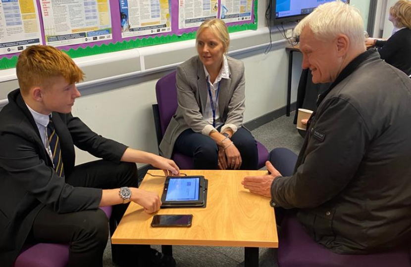 Graham speaking to a pupil at Withernsea High School