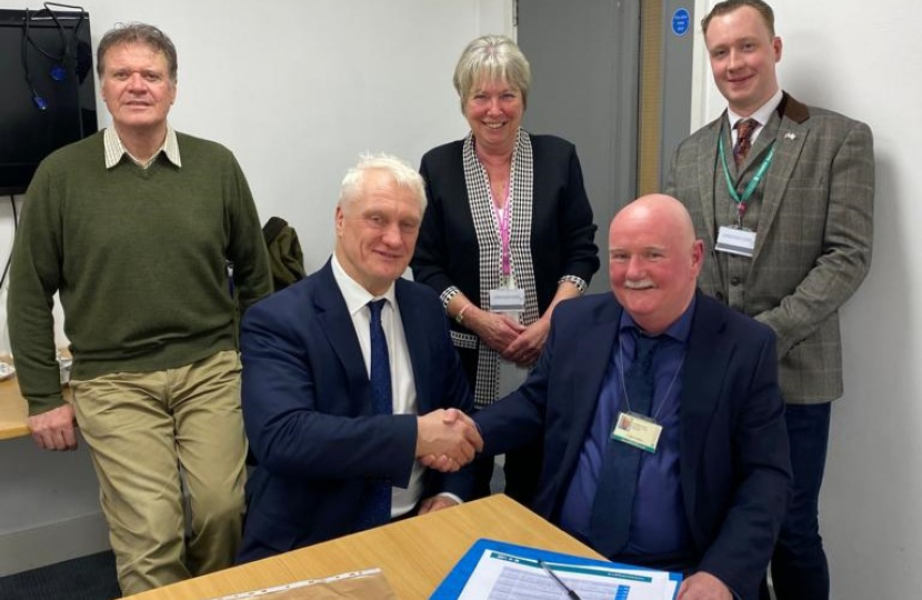 Photo of Graham Stuart MP shaking hands with Colin Walker, Transportation Services Manager at ERYC