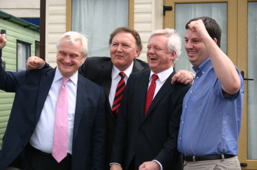 Graham celebrating Caravan Tax win with David Davis MP and Greg Knight MP. 