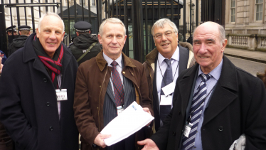 Les Diment, Cllr Mike Bryan, Cllr John Denis and Ron Smith handing Graham's Home Flood Insurance Petition into No.10