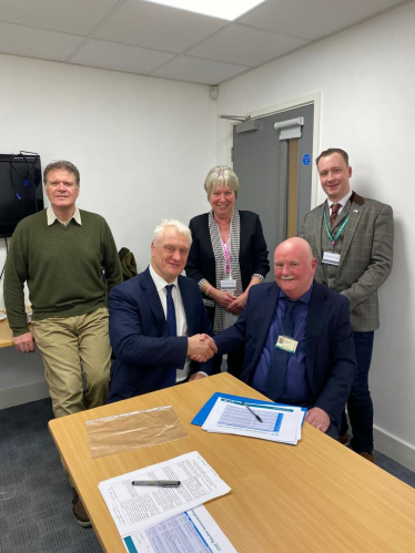 Graham Stuart MP shaking hands with Colin Walker, Transportation Services Manager at ERYC