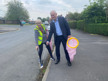 Graham picking up litter