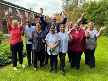 Graham Stuart with carers and staff at Beverley Grange Nursing Home