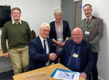 Photo of Graham Stuart MP shaking hands with Colin Walker, Transportation Services Manager at ERYC